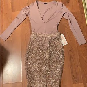 Two piece body-suit & skirt outfit.